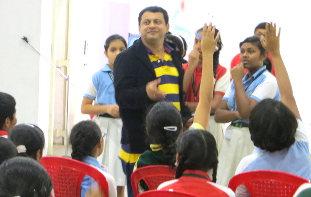 Deepak Thimaya interacting with students at a Verbattle session